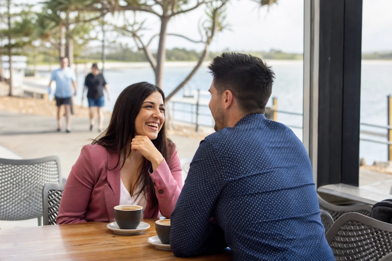 Two people talking over coffee in Cleveland